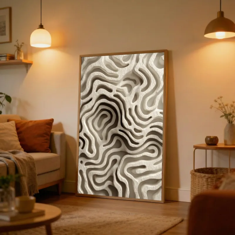 Abstract three-dimensional sculptural relief of continuous flowing organic lines carved into a sand-coloured textured surface with soft shadows creating a topographic pattern in warm cream and taupe tones