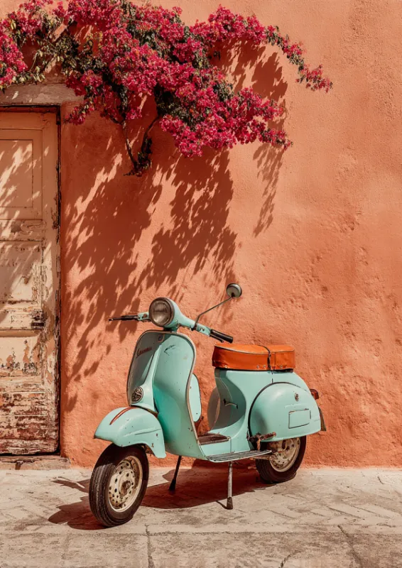Mint green vintage scooter with tan leather seat parked against a sun-warmed terracotta pink plaster wall with cascading magenta bougainvillea flowers and a rustic weathered wooden door